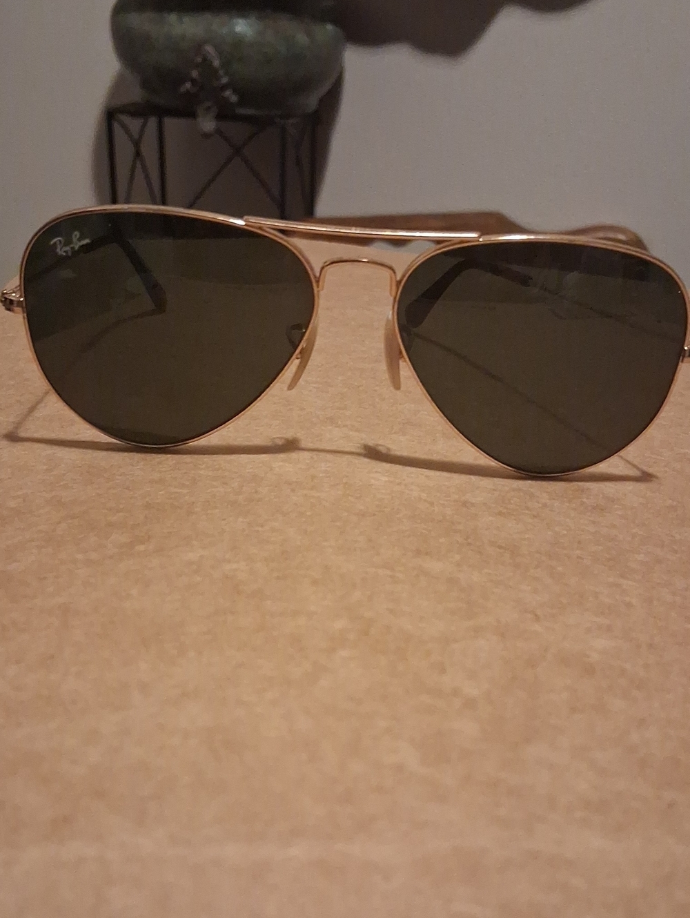 Vintage Ray-Ban Gold Frame Sunglasses with Dark Lenses.